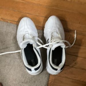 Adidas Traxion golf shoes.